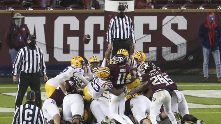 Nov 28, 2020; College Station, Texas, USA; Texas A&M Aggies quarterback Kellen Mond (11) fumbles the ball on the goal line against the LSU Tigers in the second quarter at Kyle Field. Mandatory Credit: Thomas Shea-USA TODAY Sports