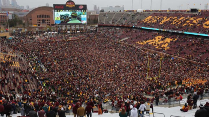 MINNEAPOLIS, MN – NOVEMBER 09: Minnesota Golden Gophers and fans storm the field while hoisting the Governor’s Victory Bell after defeating the Penn State Nittany Lions 31-26 to remain undefeated at TCFBank Stadium on November 9, 2019 in Minneapolis, Minnesota. (Photo by Adam Bettcher/Getty Images)