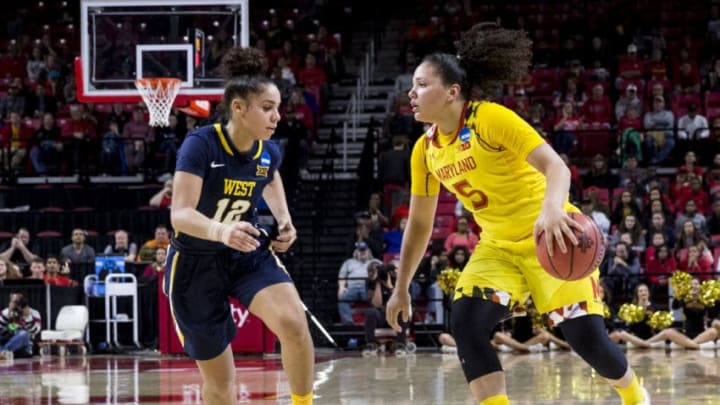 COLLEGE PARK, MD - MARCH 19: Maryland Terrapins guard Destiny Slocum (5) dribbles up to West Virginia Mountaineers guard Chania Ray (12) during a Div. 1 NCAA Women's basketball 2nd. round game between Maryland and West Virginia on March 19, 2017, at Xfinity Center in College Park, Maryland. Maryland defeated West Virginia 83-56. (Photo by Tony Quinn/Icon Sportswire via Getty Images)