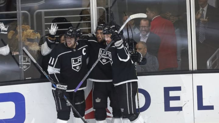 LOS ANGELES, CA - OCTOBER 07: Los Angeles Kings center Anze Kopitar (11), Los Angeles Kings left wing Alex Iafallo (19), and Los Angeles Kings right wing Ilya Kovalchuk (17) celebrate after Kopitar scores a goal during the game against the Detroit Red Wings on October 07, 2018, at Staples Center in Los Angeles, CA. (Photo by Adam Davis/Icon Sportswire via Getty Images)