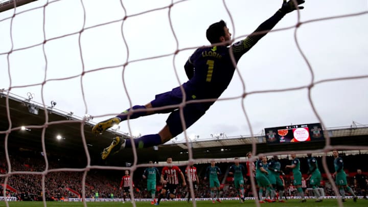 SOUTHAMPTON, ENGLAND - MARCH 09: Hugo Lloris of Tottenham Hotspur dives for the ball as James Ward-Prowse of Southampton scores his team's second goal during the Premier League match between Southampton FC and Tottenham Hotspur at St Mary's Stadium on March 09, 2019 in Southampton, United Kingdom. (Photo by Catherine Ivill/Getty Images)