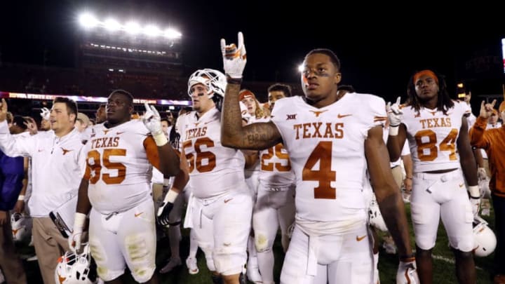 AMES, IA - SEPTEMBER 28: The Texas Longhorns celebrate their 17-7 win over the Iowa State Cyclones at Jack Trice Stadium on September 28, 2017 in Ames, Iowa. The Texas Longhorns won 17-7 over the Iowa State Cyclones. (Photo by David Purdy/Getty Images)