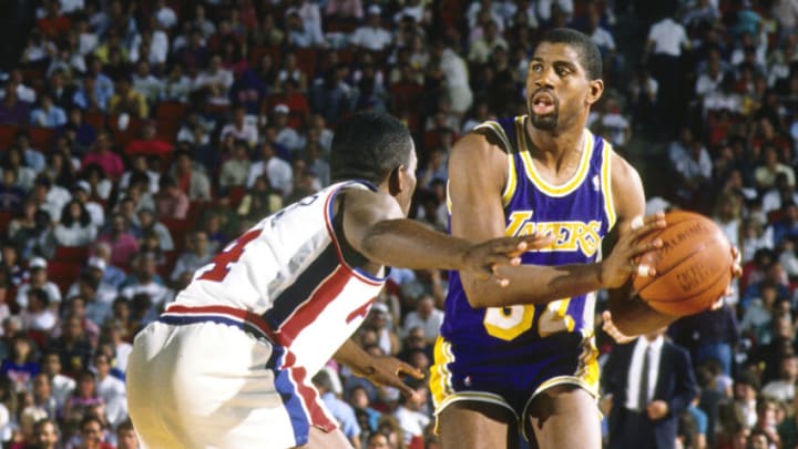 Los Angeles Lakers guard Magic Johnson (32) is defended by Detroit Pistons guard Joe Dumars (4)Credit: MPS-USA TODAY Sports