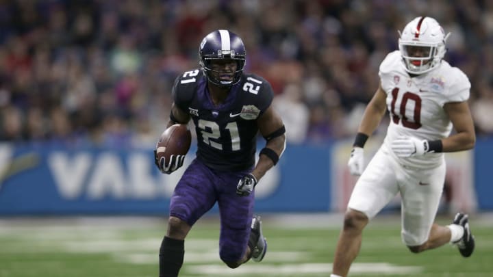 SAN ANTONIO, TX – DECEMBER 28: Kyle Hicks #21 of the TCU Horned Frogs runs the ball for a gain in the second quarter pursued by Jordan Fox #10 of the Stanford Cardinal during the Valero Alamo Bowl at the Alamodome on December 28, 2017 in San Antonio, Texas. (Photo by Tim Warner/Getty Images)