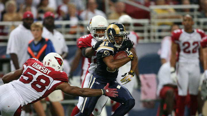 Oct 07, 2007 - St. Louis, MO, USA - The Arizona Cardinals KARLOS DANSBY against the St. Louis Rams TORRY HOLT at the Edward Jones Dome. The Cardinals won 34-31 in the NFC West matchup. (Photo by Albert Dickson/Sporting News via Getty Images)