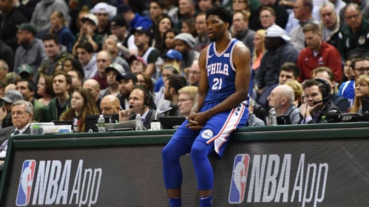MILWAUKEE, WI - MARCH 04: Joel Embiid #21 of the Philadelphia 76ers waits to go into a game against the Milwaukee Bucks at the Bradley Center on March 4, 2018 in Milwaukee, Wisconsin. NOTE TO USER: User expressly acknowledges and agrees that, by downloading and or using this photograph, User is consenting to the terms and conditions of the Getty Images License Agreement. (Photo by Stacy Revere/Getty Images)