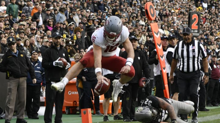 BOULDER, CO - NOVEMBER 10: Washington State Cougars quarterback Gardner Minshew (16) reaches across the goal line and scores a touchdown over Colorado Buffaloes linebacker Rick Gamboa (32) in the third quarter at Folsom Field November 10, 2018. Washington State won 31-7. (Photo by Andy Cross/The Denver Post via Getty Images)