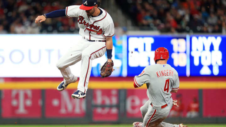 FanDuel MLB: ATLANTA, GA - MARCH 30: Dansby Swanson #7 of the Atlanta Braves fails to catch an errant throw to second as Scott Kingery #4 of the Philadelphia Phillies slides in safely for a stolen base during the fourth inning at SunTrust Park on March 30, 2018 in Atlanta, Georgia. (Photo by Daniel Shirey/Getty Images)