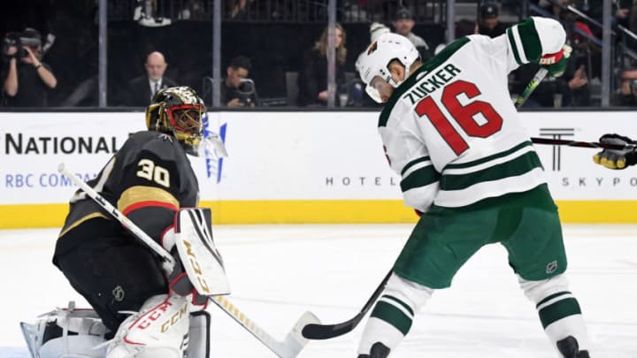 LAS VEGAS, NEVADA - MARCH 29: Malcolm Subban #30 of the Vegas Golden Knights blocks a shot as Jason Zucker #16 of the Minnesota Wild looks for a rebound in the first period of their game at T-Mobile Arena on March 29, 2019 in Las Vegas, Nevada. The Wild defeated the Golden Knights 3-2. (Photo by Ethan Miller/Getty Images)