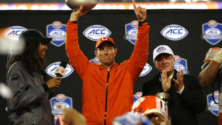 CHARLOTTE, NC - DECEMBER 01: Clemson Tigers head coach Dabo Swinney hold up the trophy after winning the ACC Championship game between the Pittsburgh Panthers and the Clemson Tigers on December 01,2018 at Bank of America Stadium in Charlotte,NC. (Photo by Dannie Walls/Icon Sportswire via Getty Images)