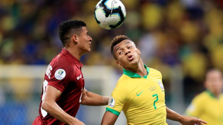SALVADOR, BRAZIL - JUNE 18: David Neres of Brazil heads the ball against Ronald Hernandez of Venezuela during the Copa America Brazil 2019 group A match between Brazil and Venezuela at Arena Fonte Nova on June 18, 2019 in Salvador, Brazil. (Photo by Buda Mendes/Getty Images)