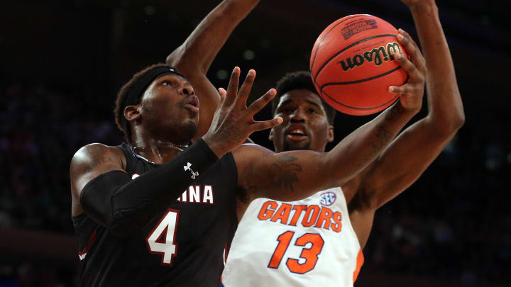 Mar 26, 2017; New York, NY, USA; South Carolina Gamecocks guard Rakym Felder (4) shoots the ball against Florida Gators forward Kevarrius Hayes (13) during the first half in the finals of the East Regional of the 2017 NCAA Tournament at Madison Square Garden. Mandatory Credit: Brad Penner-USA TODAY Sports