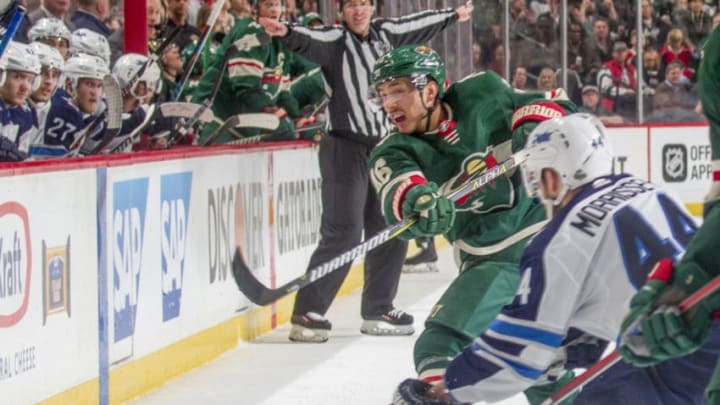 ST. PAUL, MN - APRIL 17: Jared Spurgeon #46 of the Minnesota Wild dumps the puck against the Winnipeg Jets in Game Four of the Western Conference First Round during the 2018 NHL Stanley Cup Playoffs at the Xcel Energy Center on April 17, 2018 in St. Paul, Minnesota. (Photo by Bruce Kluckhohn/NHLI via Getty Images)