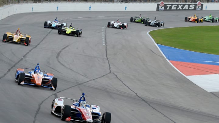 FORT WORTH, TX - JUNE 09: Tony Kanaan, driver of the #14 ABC Supply AJ Foyt Racing Chevrolet, leads a pack of cars during the Verizon IndyCar Series DXC Technology 600 at Texas Motor Speedway on June 9, 2018 in Fort Worth, Texas. (Photo by Robert Laberge/Getty Images)