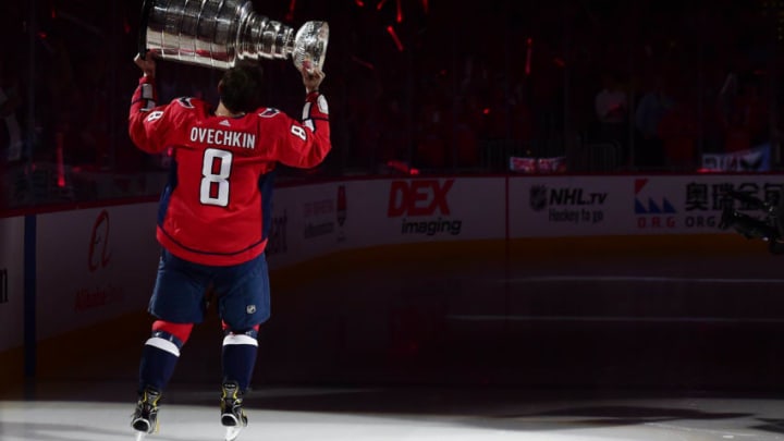 WASHINGTON, DC - OCTOBER 03: Alex Ovechkin #8 of the Washington Capitals skates with the Stanley Cup prior to watching the 2018 Stanley Cup Championship banner rise to the rafters before playing against the Boston Bruins at Capital One Arena on October 3, 2018 in Washington, DC. (Photo by Patrick McDermott/NHLI via Getty Images)