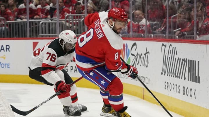 WASHINGTON, DC - JANUARY 11: Alex Ovechkin #8 of the Washington Capitals skates with the puck against P.K. Subban #76 of the New Jersey Devils in the first period at Capital One Arena on January 11, 2020 in Washington, DC. (Photo by Patrick McDermott/NHLI via Getty Images)