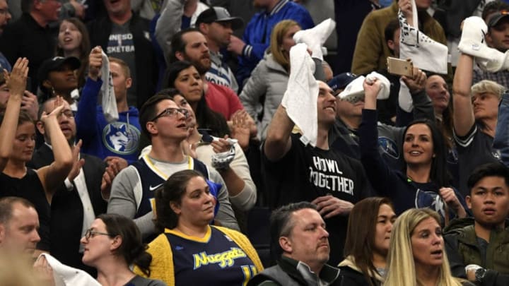 MINNEAPOLIS, MN - APRIL 11: A very few Denver Nuggets fans watch during their the overtime loss of their winner-take-all regular-season finale vs the Minnesota Timberwolves 112 -106 at the Target Center in downtown Minneapolis. April 11, 2018 Minneapolis, Minnesota. (Photo by Joe Amon/The Denver Post via Getty Images)