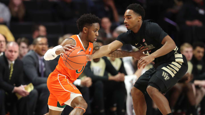 WINSTON-SALEM, NORTH CAROLINA – FEBRUARY 26: Brandon Childress #0 of the Wake Forest Demon Deacons tries to stop Chris Lykes #0 of the Miami (Fl) Hurricanes during their game at LJVM Coliseum Complex on February 26, 2019 in Winston-Salem, North Carolina. (Photo by Streeter Lecka/Getty Images)