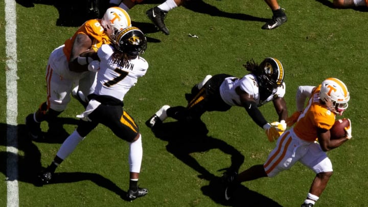 Oct 3, 2020; Knoxville, TN, USA; Tennessee running back Eric Gray (3) escapes a tackle attempted by Missouri linebacker Nick Bolton (32) during a SEC conference football game between the Tennessee Volunteers and the Missouri Tigers held at Neyland Stadium. Mandatory Credit: Brianna Paciorka-USA TODAY NETWORK