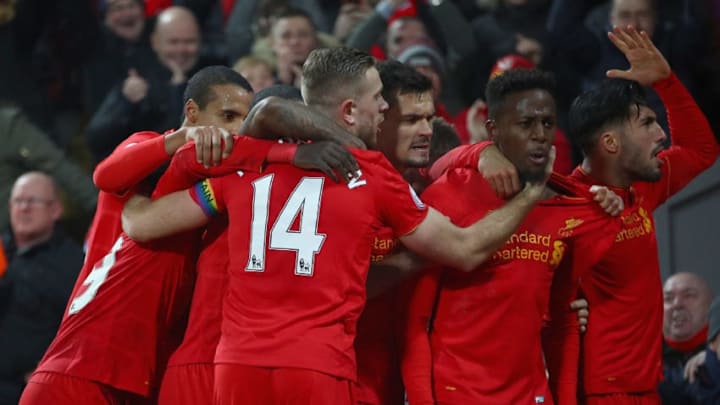 LIVERPOOL, ENGLAND - NOVEMBER 26: Divock Origi (2nd R) of Liverpool celebrates scoring the opening goal with his captain Jordan Henderson (14) and his team mates during the Premier League match between Liverpool and Sunderland at Anfield on November 26, 2016 in Liverpool, England. (Photo by Clive Brunskill/Getty Images)