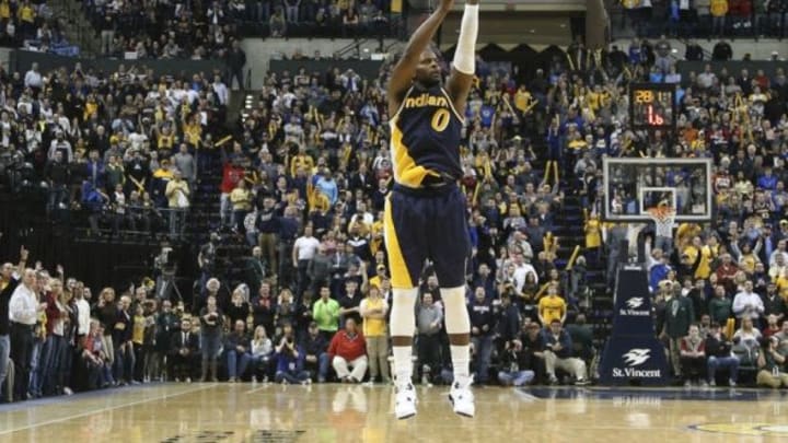 Feb 22, 2015; Indianapolis, IN, USA; Indiana Pacers guard C.J. Miles (0) makes a game winning three point shot with 28 seconds to go against the Golden State Warriors at Bankers Life Fieldhouse. Indiana defeats Golden State 104-98. Mandatory Credit: Brian Spurlock-USA TODAY Sports