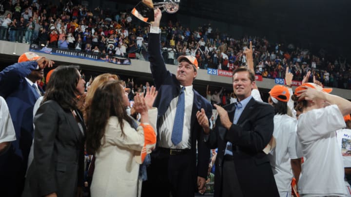 YPSILANTI, MI - OCTOBER 5: Head Coach Bill Laimbeer of the Detroit Shock raises the championship trophy after they win against the San Antonio Silver Stars in Game Three of the WNBA Finals to become WNBA Champions on October 5, 2008 at Eastern Michigan's Convocation Center in Ypsilanti, Michigan. NOTE TO USER: User expressly acknowledges and agrees that, by downloading and/or using this photograph, User is consenting to the terms and conditions of the Getty Images License Agreement. Mandatory Copyright Notice: Copyright 2008 NBAE (Photo by Allen Einstein/NBAE via Getty Images)