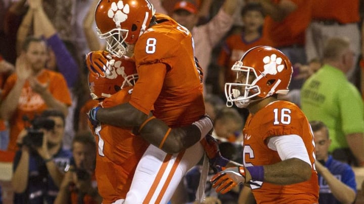 Oct 1, 2016; Clemson, SC, USA; Clemson Tigers wide receiver Deon Cain (8) celebrates with teammates after scoring a touchdown during the second quarter against the Louisville Cardinals at Clemson Memorial Stadium. Mandatory Credit: Joshua S. Kelly-USA TODAY Sports