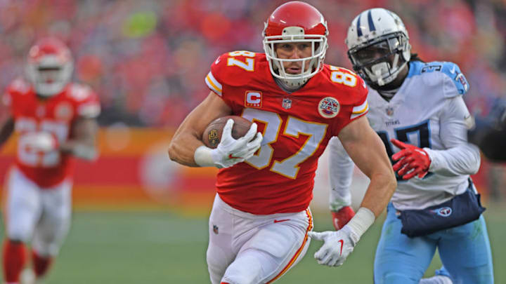 KANSAS CITY, MO - JANUARY 6: Tight end Travis Kelce #87 of the Kansas City Chiefs runs up field after catching a pass against the Tennessee Titans during the first half of the game at Arrowhead Stadium on January 6, 2018 in Kansas City, Missouri. (Photo by Peter G. Aiken/Getty Images)