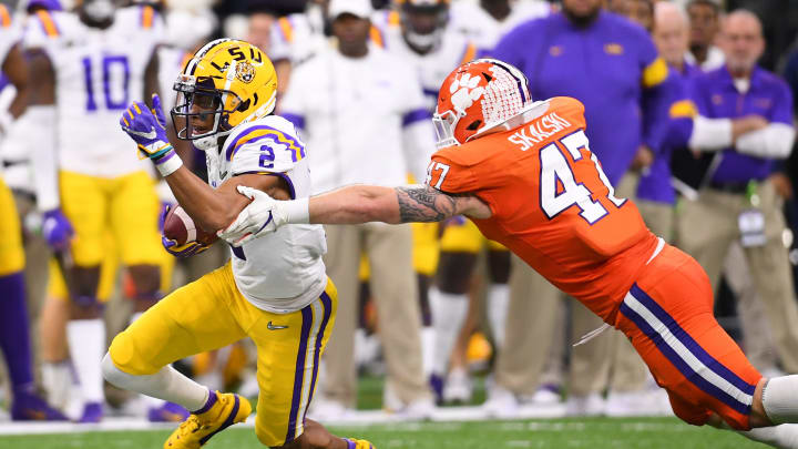 NEW ORLEANS, LA – JANUARY 13: Justin Jefferson #2 of the LSU Tigers runs past James Skalski #47 of the Clemson Tiger during the College Football Playoff National Championship held at the Mercedes-Benz Superdome on January 13, 2020 in New Orleans, Louisiana. (Photo by Jamie Schwaberow/Getty Images)