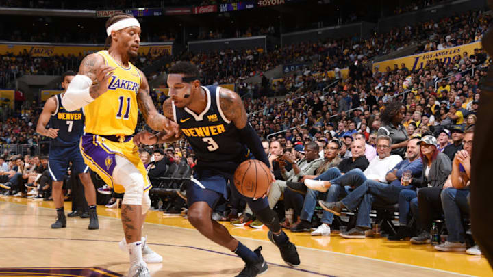 LOS ANGELES, CA - OCTOBER 2: Torrey Craig #3 of the Denver Nuggets handles the ball against the Los Angeles Lakers during a pre-season game on October 2, 2018 at STAPLES Center in Los Angeles, California. NOTE TO USER: User expressly acknowledges and agrees that, by downloading and/or using this Photograph, user is consenting to the terms and conditions of the Getty Images License Agreement. Mandatory Copyright Notice: Copyright 2018 NBAE (Photo by Andrew D. Bernstein/NBAE via Getty Images)