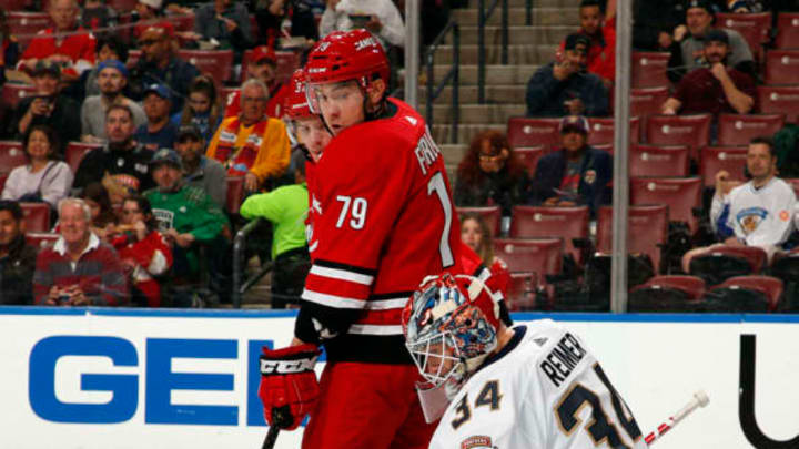 SUNRISE, FL – FEBRUARY 21: Goaltender James Reimer #34 of the Florida Panthers defends the net against Micheal Ferland #79 of the Carolina Hurricanes at the BB&T Center on February 21, 2019 in Sunrise, Florida. (Photo by Eliot J. Schechter/NHLI via Getty Images)