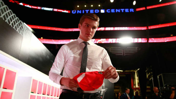 CHICAGO, IL - JUNE 23: Michael Rasmussen, ninth overall pick of the Detroit Red Wings, holds his hat during Round One of the 2017 NHL Draft at United Center on June 23, 2017 in Chicago, Illinois. (Photo by Jeff Vinnick/NHLI via Getty Images)