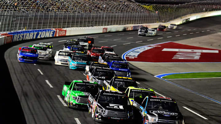 CHARLOTTE, NC - MAY 17: NASCAR Truck Series drivers restart for the final time in the 2019 NC Education Lottery 200 at Charlotte Motor Speedway (Photo by Jared C. Tilton/Getty Images) CHARLOTTE, NC - MAY 17: NASCAR Truck Series drivers restart for the final time in the 2019 NC Education Lottery 200 at Charlotte Motor Speedway (Photo by Jared C. Tilton/Getty Images)