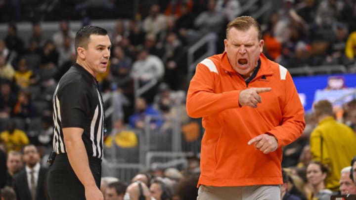 Dec 22, 2022; St. Louis, Missouri, USA; Illinois Fighting Illini head coach Brad Underwood reacts as he talks to a referee during the second half against the Missouri Tigers at Enterprise Center. Mandatory Credit: Jeff Curry-USA TODAY Sports