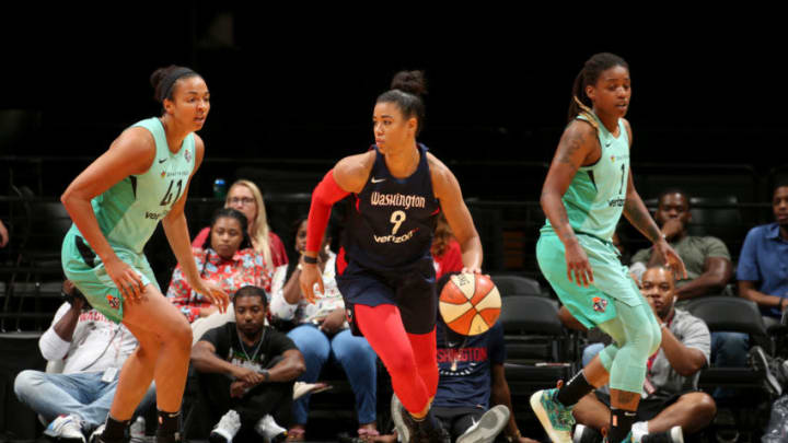 WASHINGTON, DC - JULY 5: Natasha Cloud #9 of the Washington Mystics handles the ball against the New York Liberty on July 5, 2018 at the Verizon Center in Washington, DC. NOTE TO USER: User expressly acknowledges and agrees that, by downloading and or using this photograph, User is consenting to the terms and conditions of the Getty Images License Agreement. Mandatory Copyright Notice: Copyright 2018 NBAE. (Photo by Ned Dishman/NBAE via Getty Images)