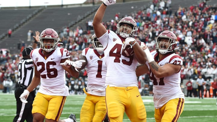 Sep 18, 2021; Pullman, Washington, USA; USC Trojans defensive lineman Tuli Tuipulotu (49) celebrates a touchdown against the Washington State Cougars in the second half at Gesa Field at Martin Stadium. The Trojans won 45-14. Mandatory Credit: James Snook-USA TODAY Sports