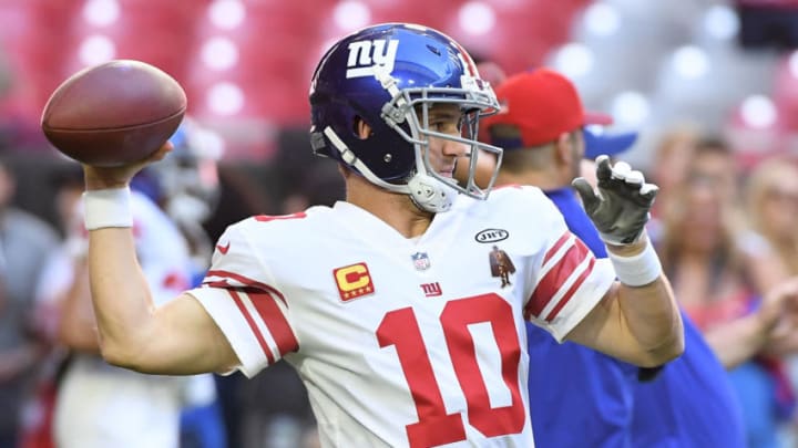 GLENDALE, AZ - DECEMBER 24: Quarterback Eli Manning #10 of the New York Giants warms up for the NFL game against the Arizona Cardinals at University of Phoenix Stadium on December 24, 2017 in Glendale, Arizona. (Photo by Norm Hall/Getty Images)