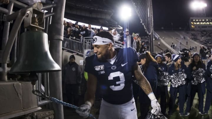 STATE COLLEGE, PA - NOVEMBER 30: Ricky Slade #3 of the Penn State Nittany Lions rings the victory bell after the game against the Rutgers Scarlet Knights at Beaver Stadium on November 30, 2019 in State College, Pennsylvania. (Photo by Scott Taetsch/Getty Images)
