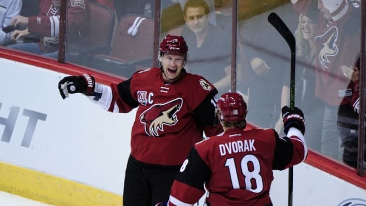 Oct 15, 2016; Glendale, AZ, USA; Arizona Coyotes right wing Shane Doan (19) celebrates with left wing Christian Dvorak (18) after scoring a goal in the first period against Philadelphia Flyers at Gila River Arena. Mandatory Credit: Matt Kartozian-USA TODAY Sports