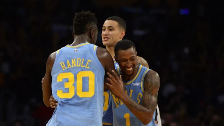 LOS ANGELES, CA - OCTOBER 25: Kentavious Caldwell-Pope #1 of the Los Angeles Lakers celebrates with his teamate Julius Randle #30 and Kyle Kuzma #40 against the Washington Wizards on October 25, 2017 at STAPLES Center in Los Angeles, California. NOTE TO USER: User expressly acknowledges and agrees that, by downloading and or using this photograph, User is consenting to the terms and conditions of the Getty Images License Agreement.Ê (Photo by Robert Laberge/Getty Images) LOS ANGELES, CA - OCTOBER 25: Kentavious Caldwell-Pope #1 of the Los Angeles Lakers celebrates with his teamate Julius Randle #30 and Kyle Kuzma #40 against the Washington Wizards on October 25, 2017 at STAPLES Center in Los Angeles, California. NOTE TO USER: User expressly acknowledges and agrees that, by downloading and or using this photograph, User is consenting to the terms and conditions of the Getty Images License Agreement.Ê (Photo by Robert Laberge/Getty Images)