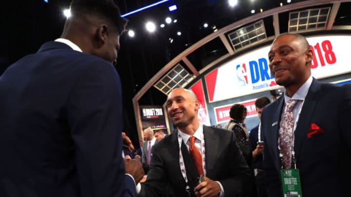 NEW YORK, NY - JUNE 21: Mohamed Bamba speaks to his former head coach Shaka Smart before the 2018 NBA Draft at the Barclays Center on June 21, 2018 in the Brooklyn borough of New York City. NOTE TO USER: User expressly acknowledges and agrees that, by downloading and or using this photograph, User is consenting to the terms and conditions of the Getty Images License Agreement. (Photo by Mike Lawrie/Getty Images)