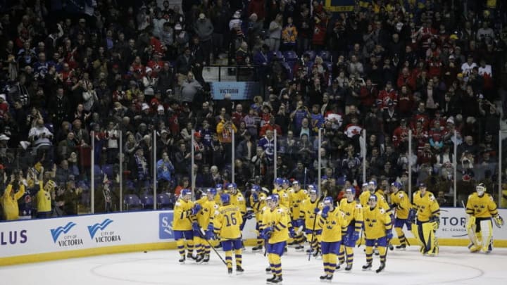 VICTORIA , BC - DECEMBER 29: Team Sweden celebrates following an overtime win versus the United States at the IIHF World Junior Championships at the Save-on-Foods Memorial Centre on December 29, 2018 in Victoria, British Columbia, Canada. (Photo by Kevin Light/Getty Images)