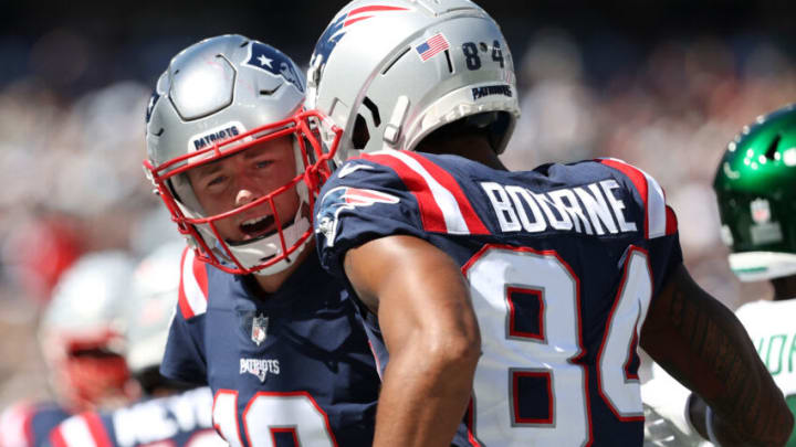 Mac Jones #10 and Kendrick Bourne #84 of the New England Patriots (Photo by Elsa/Getty Images)