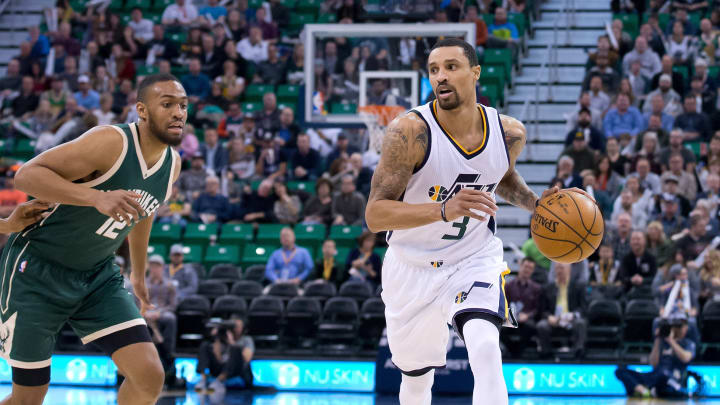 Feb 1, 2017; Salt Lake City, UT, USA; Utah Jazz guard George Hill (3) dribbles up the court as Milwaukee Bucks forward Jabari Parker (12) defends during the second half at Vivint Smart Home Arena. The Jazz won 104-88. Mandatory Credit: Russ Isabella-USA TODAY Sports