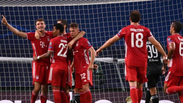 Bayern Munich players celebrating second goal against Olympique Lyon. (Photo by FRANCK FIFE/POOL/AFP via Getty Images)