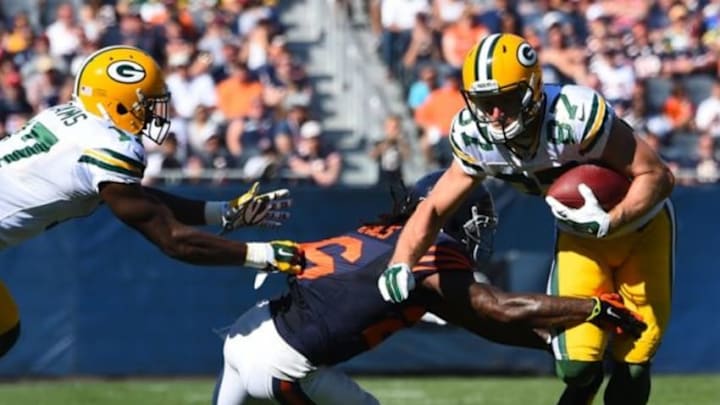 Sep 28, 2014; Chicago, IL, USA; Green Bay Packers wide receiver Jordy Nelson (87) makes a catch against Chicago Bears cornerback Tim Jennings (26) during the second half at Soldier Field. The Green Bay Packers defeats the Chicago Bears 38-17. Mandatory Credit: Mike DiNovo-USA TODAY Sports