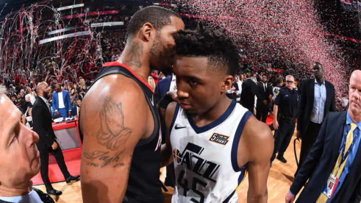 HOUSTON, TX - MAY 8: Trevor Ariza #1 of the Houston Rockets hugs Donovan Mitchell #45 of the Utah Jazz after winning the game during Game Five of the Western Conference Semifinals of the 2018 NBA Playoffs on May 8, 2018 at the Toyota Center in Houston, Texas. Copyright 2018 NBAE (Photo by Andrew D. Bernstein/NBAE via Getty Images)