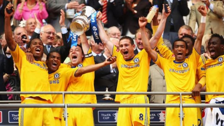 LONDON, ENGLAND - MAY 30: Captain John Terry (3rdL) of Chelsea lifts the trophy with Frank Lampard following victory during the FA Cup sponsored by E.ON Final match between Chelsea and Everton at Wembley Stadium on May 30, 2009 in London, England. (Photo by Mike Hewitt/Getty Images)