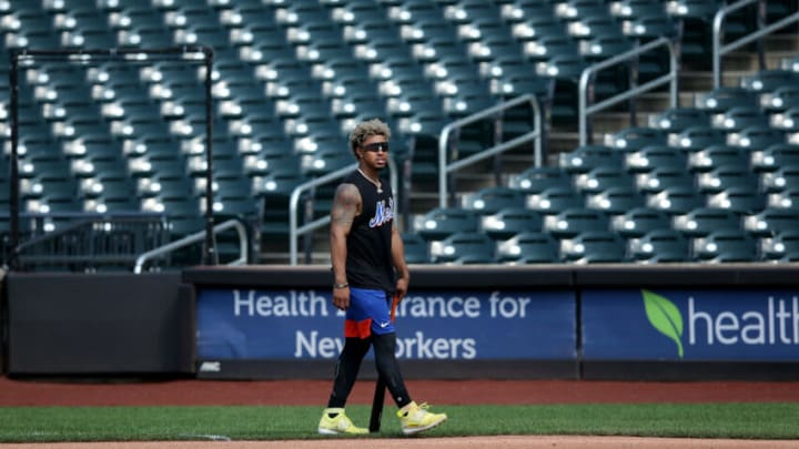 Aug 10, 2021; New York City, New York, USA; New York Mets injured shortstop Francisco Lindor works out on the field before a game against the Washington Nationals at Citi Field. Mandatory Credit: Brad Penner-USA TODAY Sports