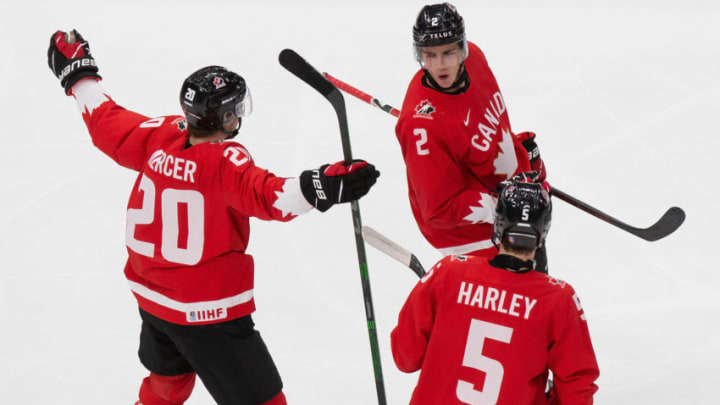EDMONTON, AB - JANUARY 04: Dawson Mercer #20, Braden Schneider #2 and Thomas Harley #5 of Canada celebrate a goal against Russia during the 2021 IIHF World Junior Championship semifinals at Rogers Place on January 4, 2021 in Edmonton, Canada. (Photo by Codie McLachlan/Getty Images)